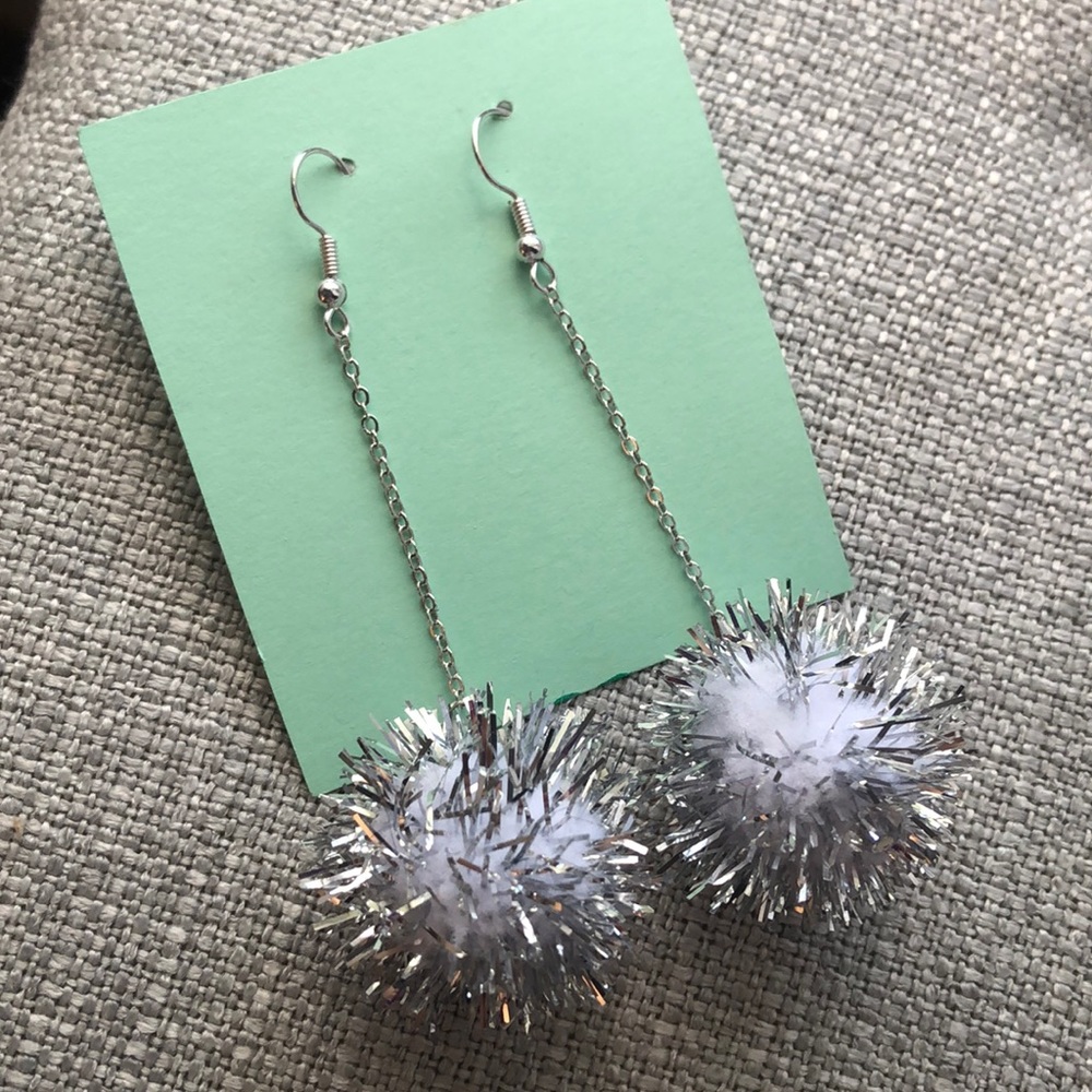 Silver dangle pom pom earrings!